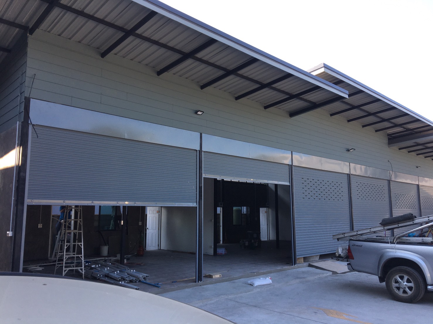 รับออกแบบ ติดตั้งประตูม้วนเหล็ก รับออกแบบ ติดตั้งประตูม้วนเหล็ก